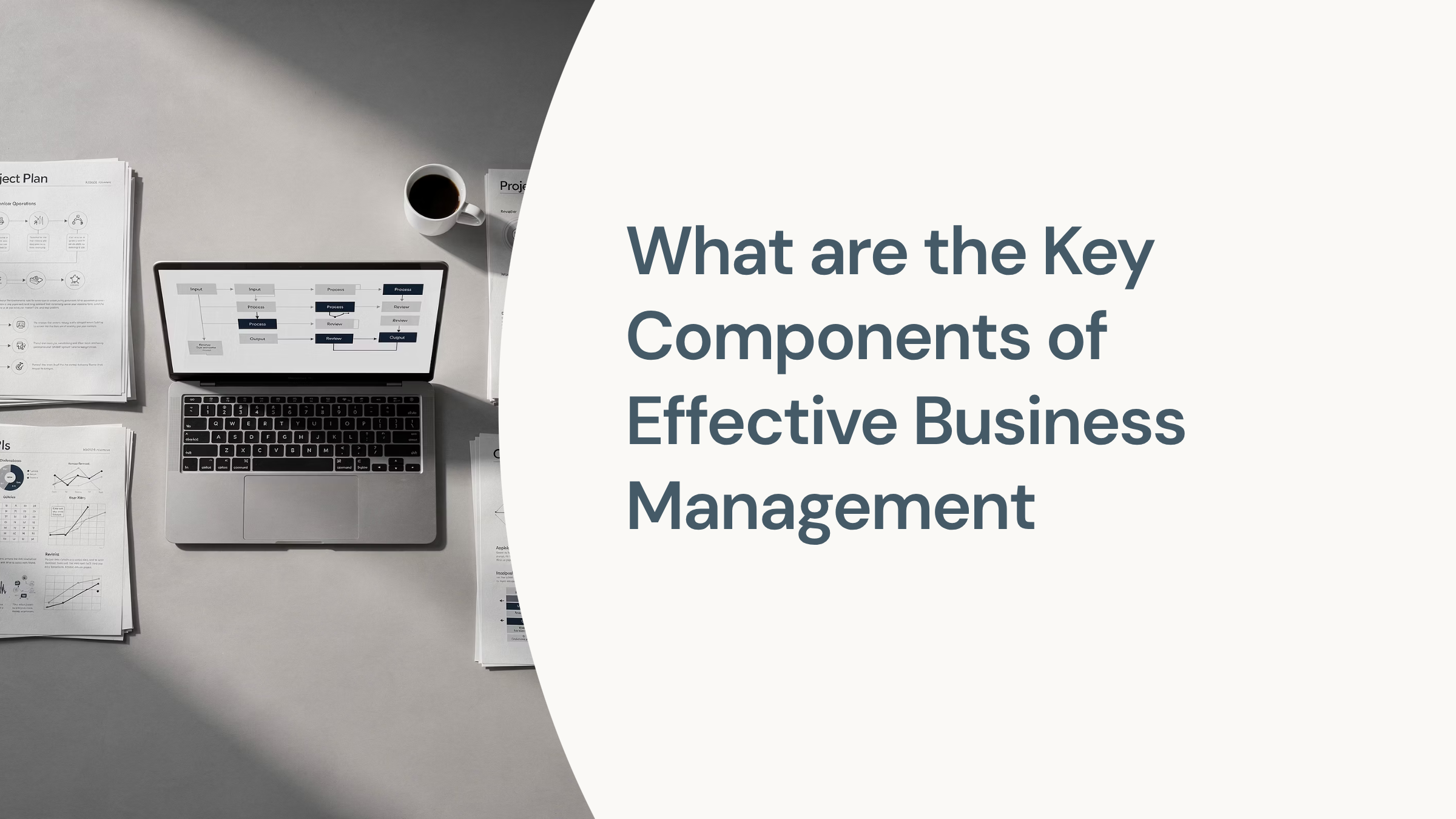 Modern executive desk with organized business materials and analytics, representing effective business management components