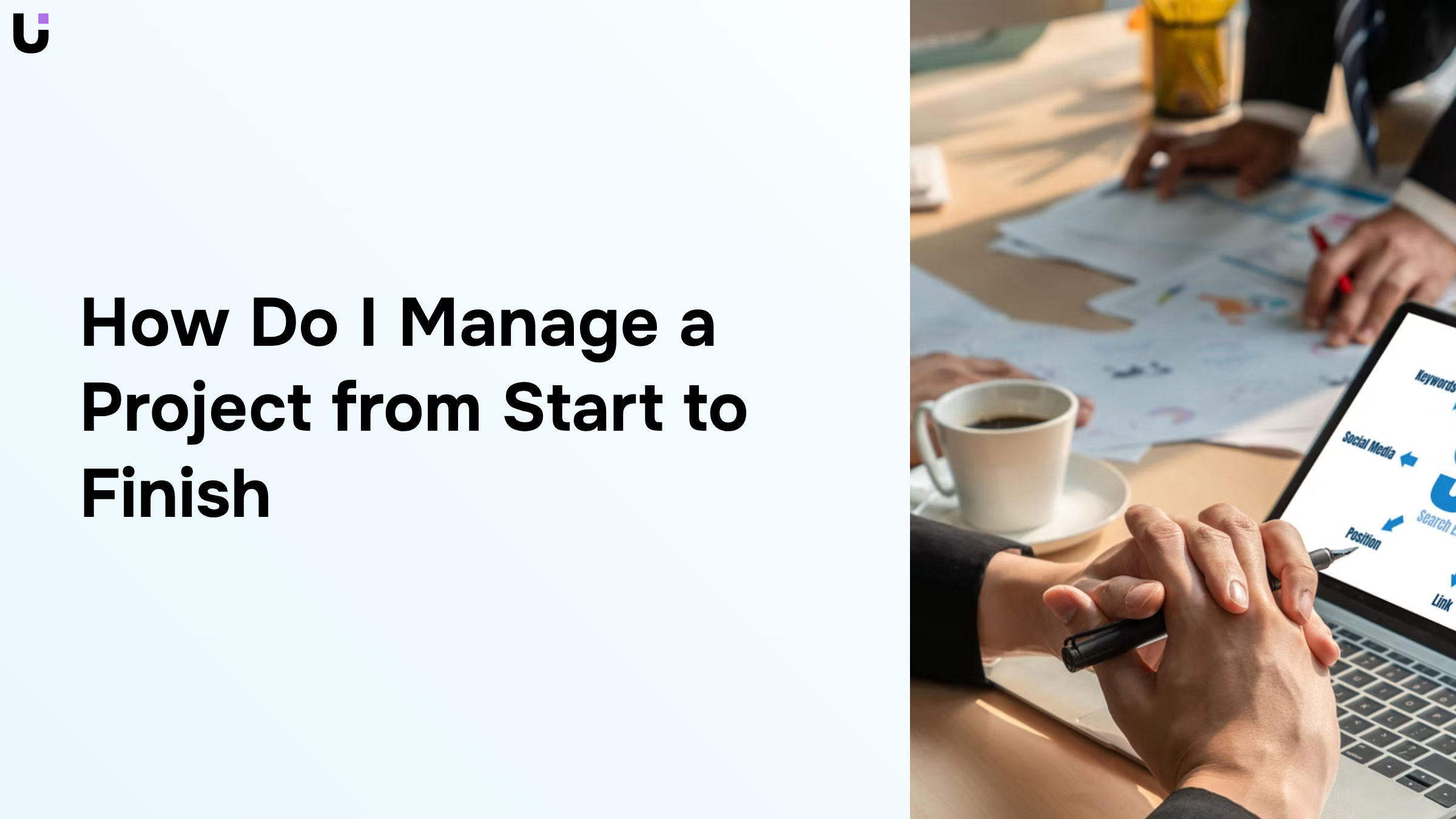 Organized project management workspace with laptop, tablet, and planning materials on desk