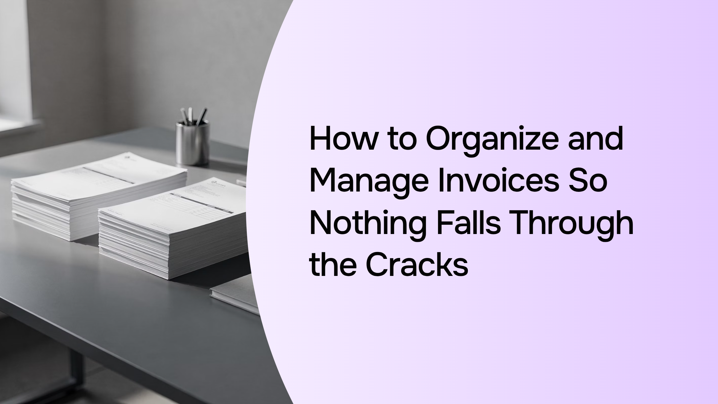 Organized invoice management workspace with documents, laptop, and professional desk setup