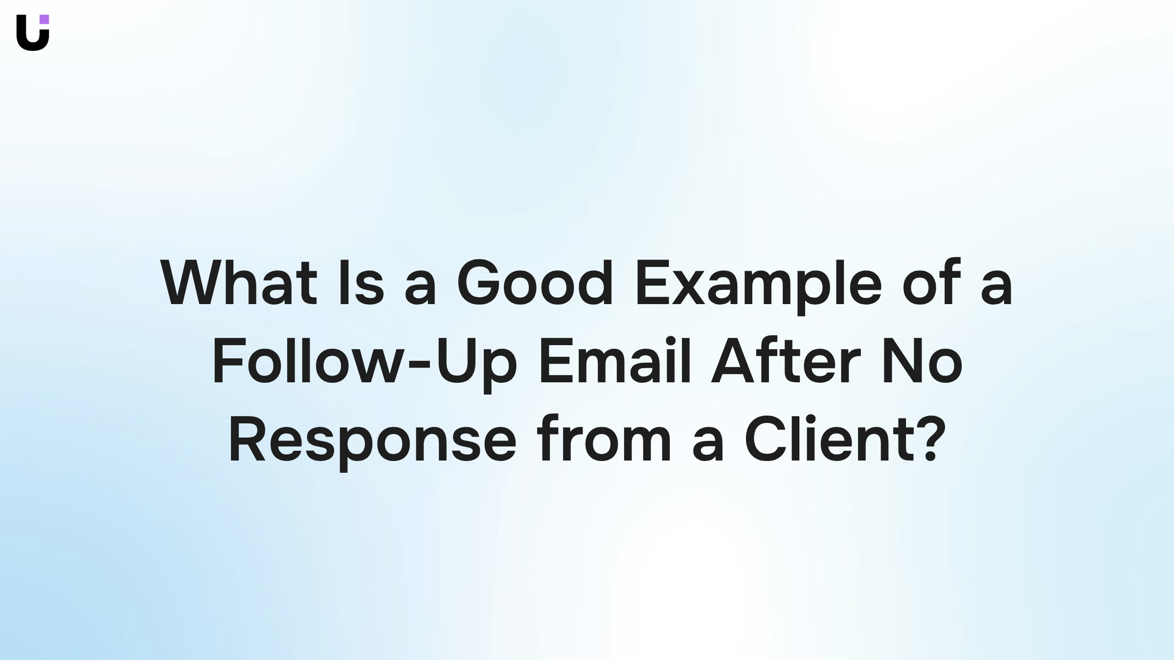 Professional workspace with laptop showing email interface, representing follow-up email best practices