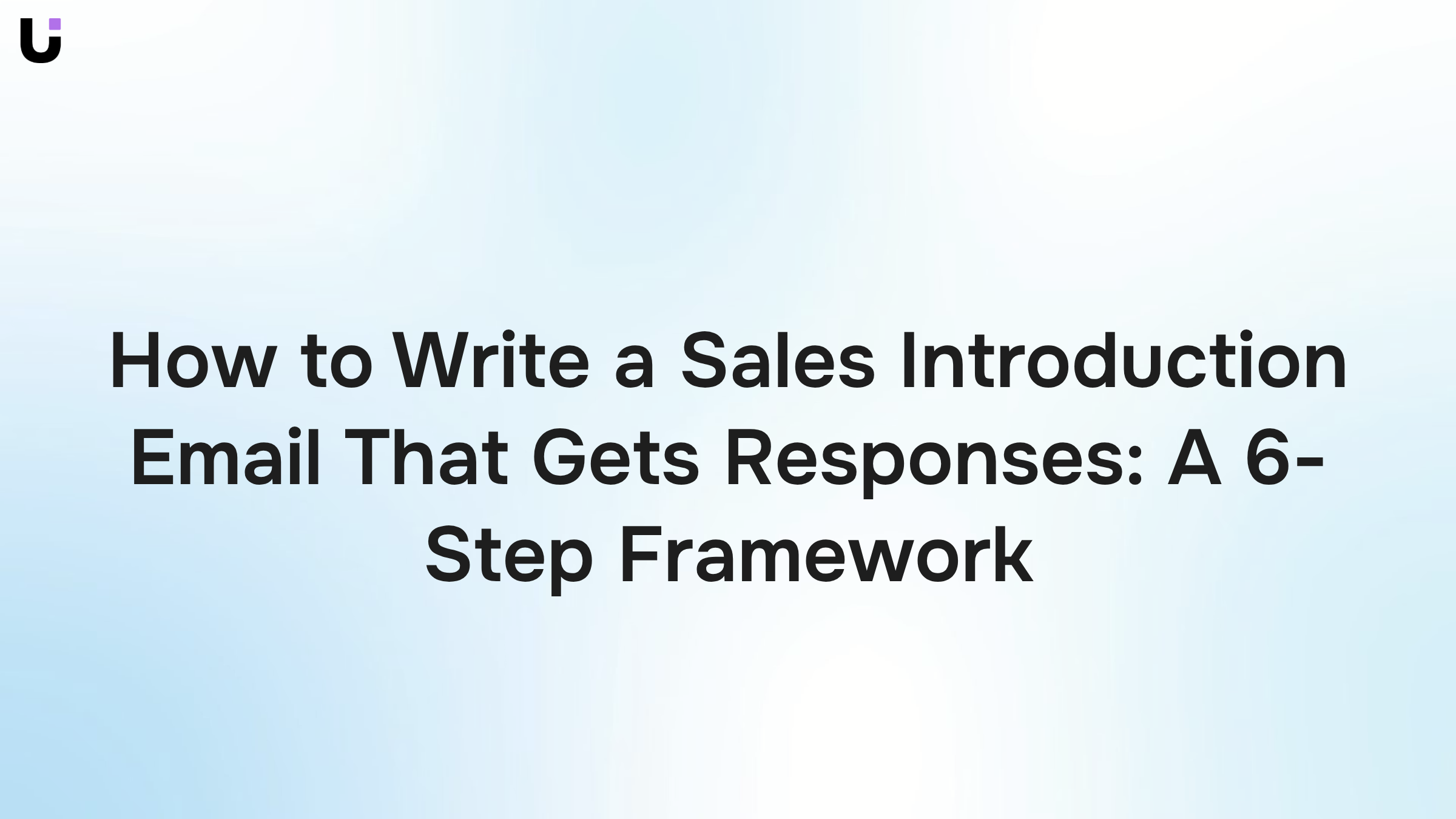 Professional desk setup with laptop displaying email interface, representing sales introduction email framework strategy